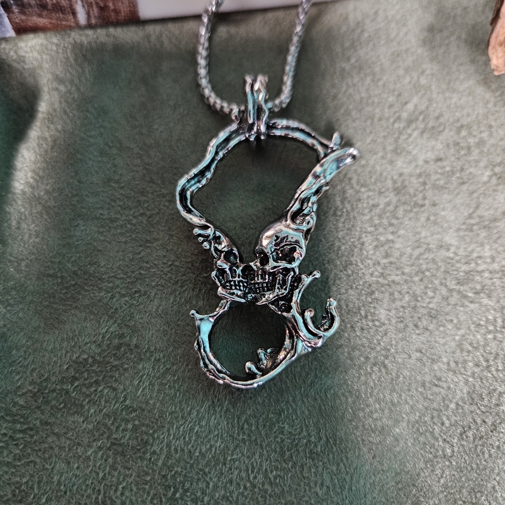 Silver Double Kiss Skull Pendant